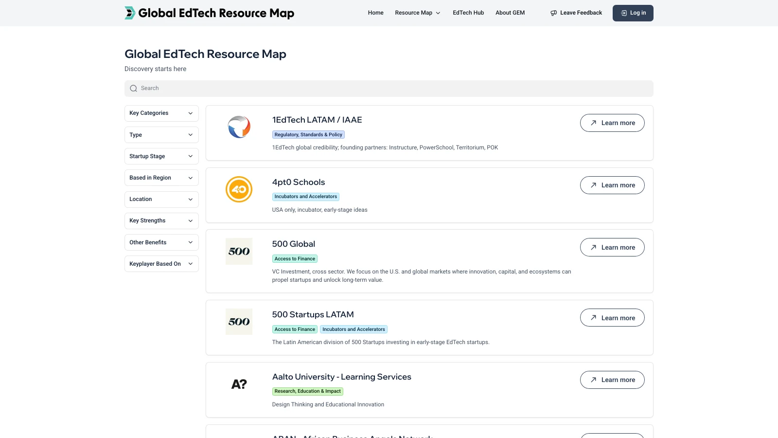 Directory list view with organization logos, names, category tags, descriptions and Learn more buttons